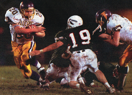 Paul Widder avoids a tackle Tuesday night in Falls' 14-0 win over Berlin.